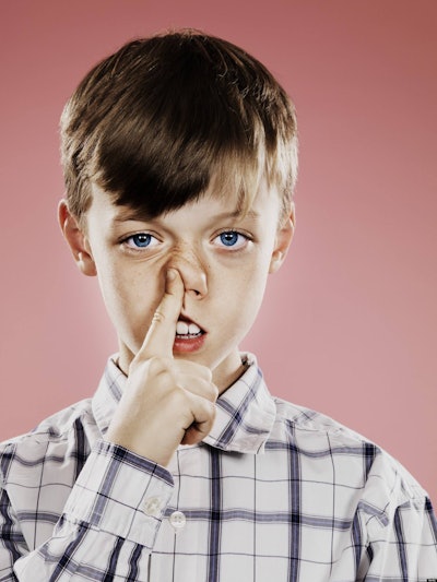 boy picking nose