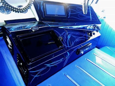 Early W series from around 1966-69, says Mariani, “had a metal desk in the cab – an old style but not very owner-operator/over-the-road friendly. Later, they added this dog box section with cup holders and a map holder” such as the one in the 1974 originally. Frank Phipps built a new center console (pictured above) and Mariani and company revamped the interior in total with old-style Knodler low-back seats and much, much more. The dash in Low Patrol is “built from scratch. We wanted to make a metal dash that I could integrate my Cobra 8500 HD Pro into.”