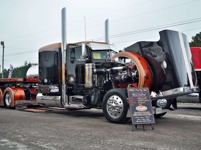 Mike Manuel’s 1984 Peterbilt 359 and matching flatbed won Best of Show in the Limited-Mileage Combo category.