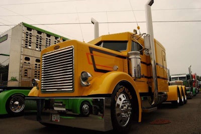 Iowa-based independent hog hauler Ron Brubaker was showing this “One of a Kind” 1993 Peterbilt, bagging Best of Show in its class last year. The owner-operator spec’d as a short hood in October 1992 and has owned ever since. He’s thought of dubbing it “never finished,” though, given mods continue to this day. Catch a vid with him by clicking through the image.