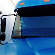Independent Brad Willis uses a Blue Tiger video camera on the windshield of his Freightliner Columbia. “You can set it for the amount of force needed to make it record,” he explains. Otherwise, “it will record in a loop on a mini-SD card,” saving over itself unless triggered manually or by a force incident, such as a hard bump or braking maneuver.