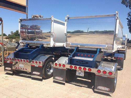 Two dump trailer rears