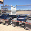 Two dump trailer rears