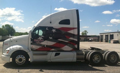 Owner-operator Lindom’s 2011 Kenworth T700 is one of two Baylor-leased tractors the owner, a military veteran, chose to decorate in Patriotic colors.
