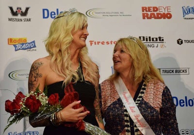 2014 Overdrive’s Most Beautiful winner Emily Weymouth, left, was crowned by the 2013 contest winner, owner-operator Maggie Stone, at The Great American Trucking show in Dallas in August 2014.