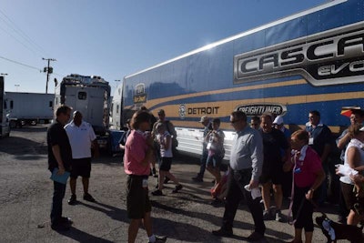After a group picture by Henry Albert’s Freightliner Team Run Smart van trailer, currently being pulled by a Ryder rental rig as Albert’s well-known 10-plus mpg Cascadia Evolution is being employed at a test track, the walk began.