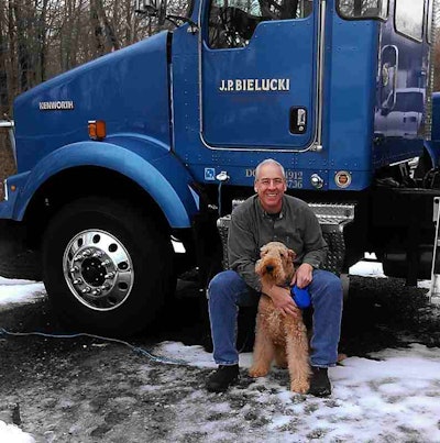 Bielucki and his dog, Jake (aka “the Jakester”), in tarping and chaining trim — around 40 pounds or more lighter following successful apnea treatment.