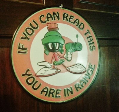 I had this sign on my office door long before I got the Taser.