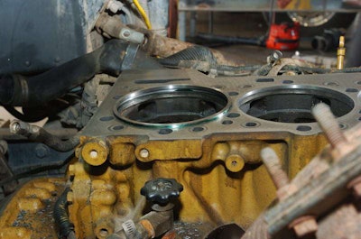 The overhead on a newly rebuilt engine should be reset at 25,000 miles.