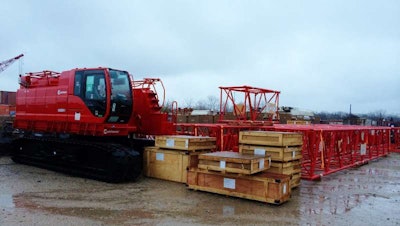 The fire-engine red Manitowoc 11000-1 crane was new and already disassembled for transport at pickup. The client in Chesapeake hired Next Exit because their team was able to arrange transport more quickly than the selling dealer, the company says.