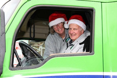 Wille Transport driver Ken Lundgren and his wife Pat. Lundgren is hauling a van load of ornaments for the Capitol Christmas tree. He is driving a Kenworth T680.