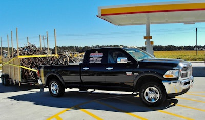 CAR/MOBILE EQUIPMENT HAULING: Owner-operator Greg Cutler, based in Wisconsin, specializes in mobile equipment with a bumper-pull set-up. The above October haul he ran for a friend in South Carolina to Wisconsin. It featured a different kind of towed vehicle. Taking farm equipment on the long run down, Cutler fashioned a side kit from plywood and lumber and hauled these bicycles in two trips back.