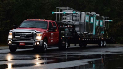 GEOGRAPHIC SPECIALIZATION: Brady’s Hotshot Hauling owner-operator Jeff Ward runs a mix of shipper-direct hotshot loads and brokered freight, like these lightweight aluminum railroad signal houses, from an Atlanta-area home base.