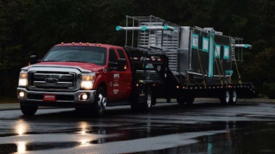 GEOGRAPHIC SPECIALIZATION: Brady’s Hotshot Hauling owner-operator Jeff Ward runs a mix of shipper-direct hotshot loads and brokered freight, like these lightweight aluminum railroad signal houses, from an Atlanta-area home base.