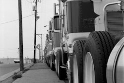 “The Kenworth dealer was right across the street from the Dart terminal in St. Paul, and I used to go over and eye the new K100s all the time. If I’d have been smart I would have taken the money I’d saved and gotten into a better truck, and stayed with Dart running for myself. I guess I just wasn’t mature enough to know the difference yet.” –Craig Ryan on the KW dealer pictured above in the 1970s