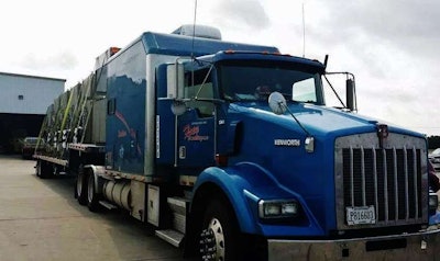 The Oestreichs’ Kenworth and step deck.