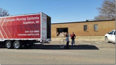 “I got to the school just after lunchtime on Saturday,” says Keilhofer. “Four teachers and two of their spouses came to help unload.” Pictured here are Mary and Bill Short.