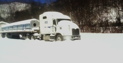 Vic Pearson’s 2013 Mack stuck at home in Topmost in Eastern Kentucky after “nearly 2 feet of snow.”