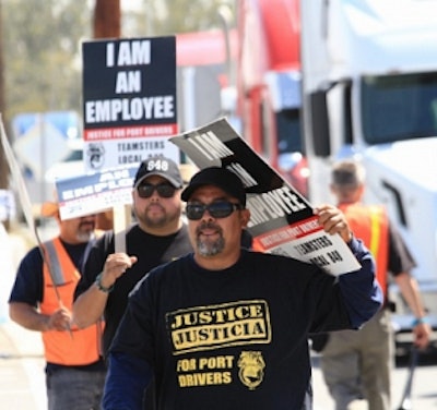 Pacer Cartage drivers protesting in November over what they claim is wage theft by the carrier and its classification of the drivers as contractors instead of employees.