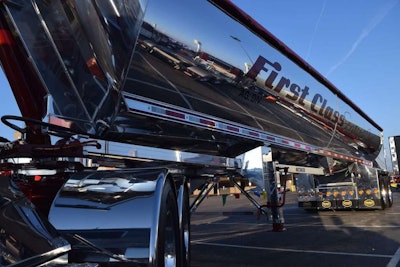 First Class Services’ Mac trailer, pulled by a 2015 Pete 389, boasts a lot of shine.