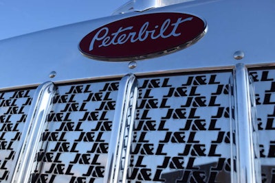 J&L is cut into the grille and air cleaners of this 2015 Pete 389 by Brunner Fabrication of Joplin, Mo., to acknowledge owner J&L Contracting of Springfield, Mo.