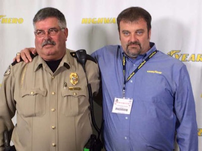 Clint Blackburn, right, and jailer Darrell Herndon have become good friends since Blackburn saved Herndon from being strangled by a prisoner. “I call him brother Darrell,” Blackburn said.