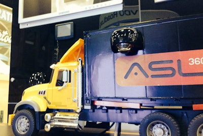 Continental Sales Manager Mike Kollar pointed this unique camera system out to me. You can see an example of the camera (not to scale, as it were: yes, those are the actual cameras’ size) positioned on the body of the model truck in the picture. Four cameras positioned in front, back and on both sides of the truck take wide-angle views to provide the driver in-cab a 360-degree display of the entire area around the truck. No more split-screen-type viewing, though drivers can toggle through to see individual-camera views for closer looks if need be. The tech is only available for straight trucks as yet, he says, but the software for articulated tractor-trailers is coming soon, with 7- or 10-inch in-cab displays. He cites a range of around $2,000-$3,500 per system for cost.