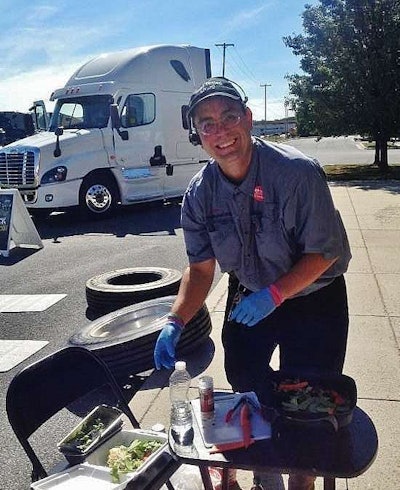 Road Tested Living founder and driver Tom Kyrk, hard at work on a recipe challenge during a September 2014 stop of the Rolling Strong Driver Wellness Tour at the Petro in Carlisle, Pa. “The recipe I was cooking,” Kyrk says, “was based on a challenge given to me to make a meal with ingredients found solely in a truck stop. It was a beef-jerky stir fry, with veggies from the salad bar.”