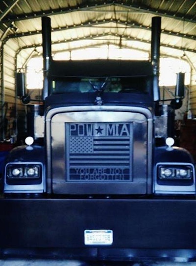 Charles Timbrook's 1999 Black Out Freightliner, Front view in shop
