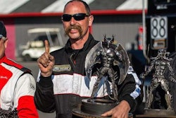 Mack tech Mike Morgan, middle, won the inaugural ChampTruck World Series points championship last season.