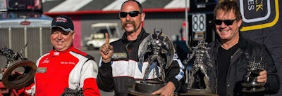 Mack tech Mike Morgan, middle, won the inaugural ChampTruck World Series points championship last season.