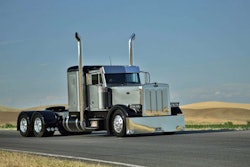 The special touches on Poulsen’s 1998 Pete 379 include a custom grille with the Poulsen Trailer Sales brand cut into it as a pattern. (Photo by Brian Bourke)