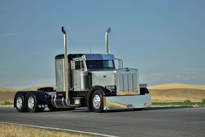 The special touches on Poulsen’s 1998 Pete 379 include a custom grille with the Poulsen Trailer Sales brand cut into it as a pattern. (Photo by Brian Bourke)