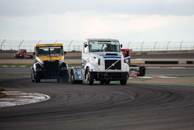 Krisztian Szabo's No. 23 Volvo, followed by Oliver's No. 31 ChampTruck Freightliner.