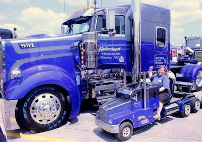 Jody Turner of Clinton, Iowa tried out a smaller version of a big rig