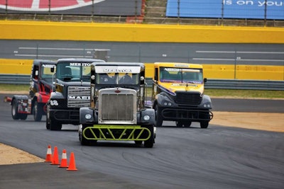 Allen Boles’ “Team Turbo” Pete 359 leading the pack, followed by the ChampTruck “Drago” Freightliner, Mack tech Mike Morgan’s No. 88 Mack and Brad Klemmenson’s No. 54 Volvo.