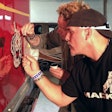 McKay, Mariani at work on some detail paint on the Mack.