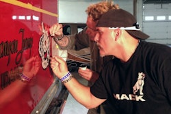 McKay, Mariani at work on some detail paint on the Mack.