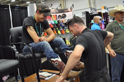 These boots are made for walking the show floor, thanks to a fine shine Kyle Lefler provided for Clint Bell.