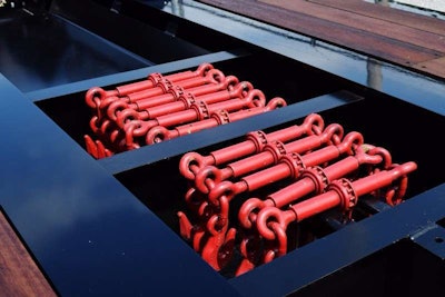 In-deck ratchet binder storage.