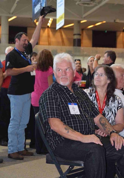 The Trucker Talent Search gets under way today, Friday, Aug. 28, at 3:30 p.m. at the Dallas Convention Center. Featured artists include finalist Don Whatley (seated, front) and event emcee Tony Justice (rear).
