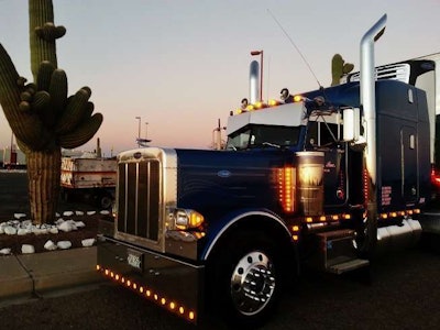 This beautiful sunset shot in Eloy, Ariz., of Tim Ramsey’s 2003 Peterbilt 379 shows the rig fresh from a “bath at Little Sisters Truck Wash.”