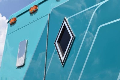 Detail along the passenger side of the sleeper shows the striping pattern.