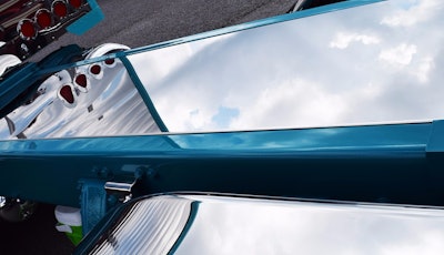 Stainless extends along the deck and fenders.