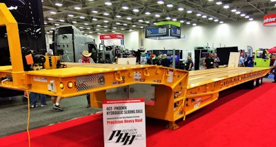 The new low-profile Phoenix Hydraulic Sliding Axle has been engineered with load maximization in mind and is geared toward all segments of the hauling industry, including construction, transportation, agriculture and towing. The trailer includes a lower deck height, four-beam main frame, increased capacity, a perimeter frame gooseneck pivot, closed cylinder while in travel position, and many more key standard features.