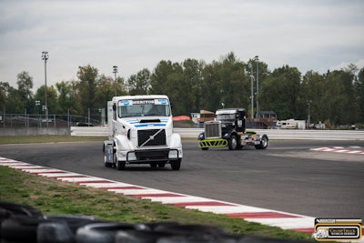 Krisztian Szabo (white and blue) and Allen Boles (black and green)