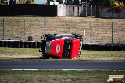 Dennis Pittsenbarger's overturned No. 11 Optima Batteries Freightliner