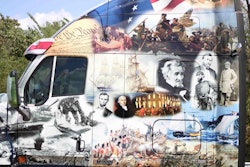 The truck is wrapped with depictions of ten wars, beginning with the Revolutionary War, and covering the War of 1812, The Civil War, WWI, WWII, Korea, Vietnam, Desert Storm, Enduring Freedom and the Iraq war. There are images of soldiers from every branch of the military, and the layout is just awesome.