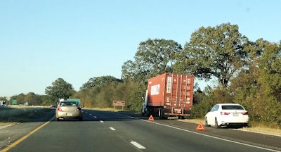 intermodal-truck-on-side-of-highway-breakdown-with-triangles