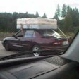 This is not how you transport a mattress.